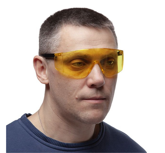 Окуляри захисні жовті, матеріал полікарбонат, регульовані завушини чорного кольору, матеріал нейлон, захист від удару INTERTOOL SP-0099